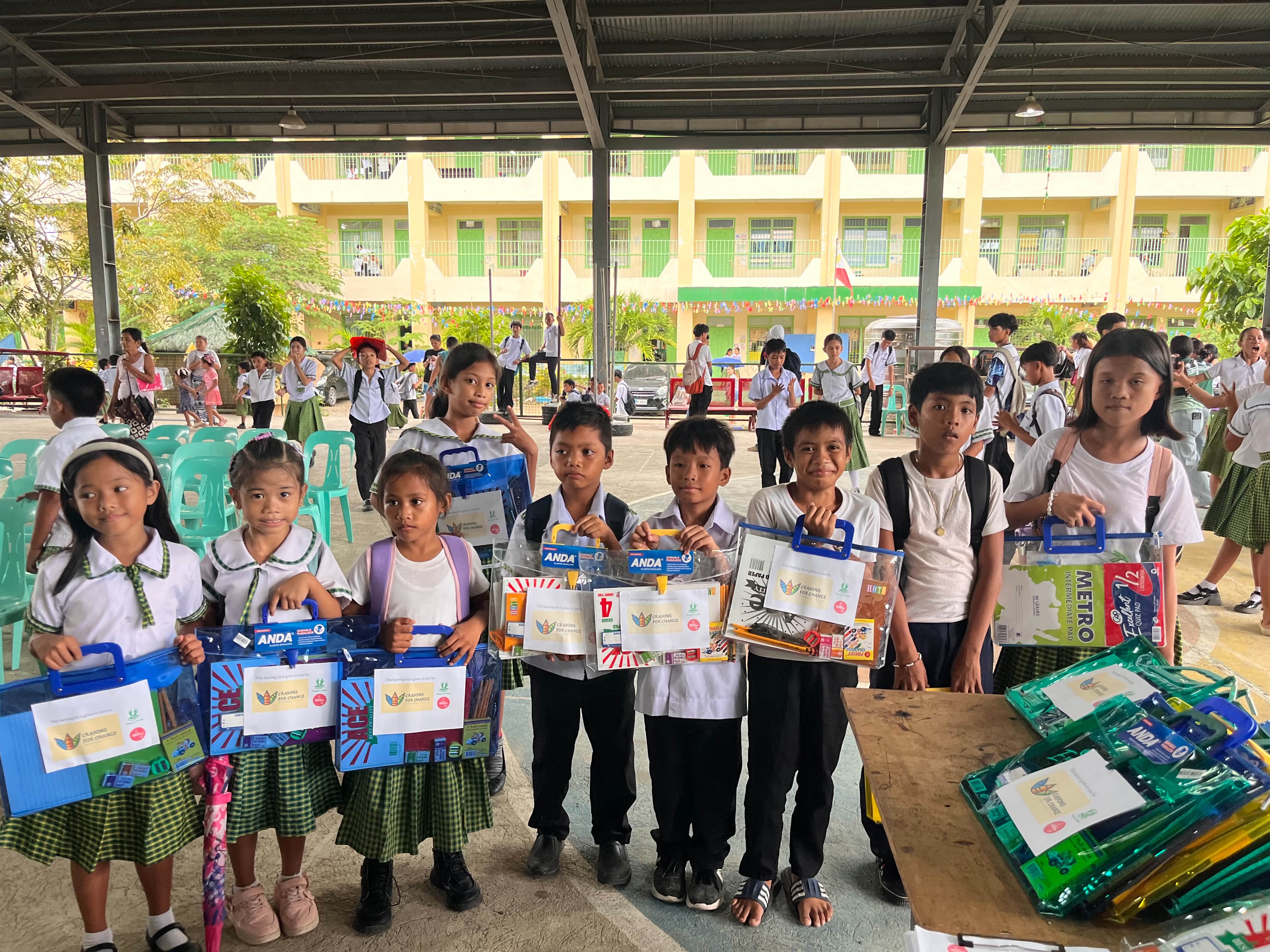 Project PITAD school supply distribution at Greendale Residences Integrated School, photo 1.